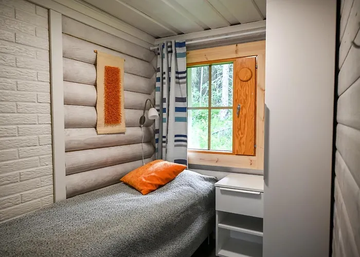 Апартаменты Rukajaerven Lomamajat 4